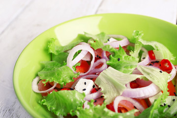 Fresh fish salad with vegetables