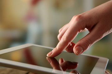 Hand using tablet PC