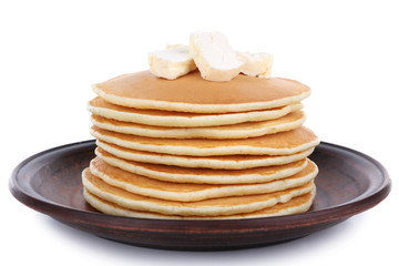 Stack of delicious pancakes with butter