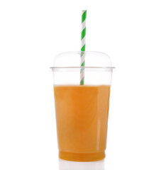 Orange juice in fast food closed cup with tube isolated on