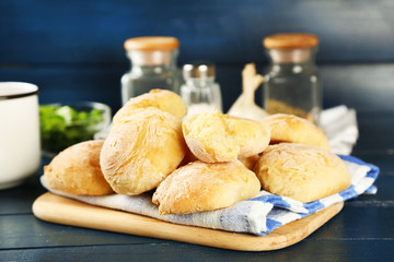 Fresh homemade bread buns from yeast dough  and jars with