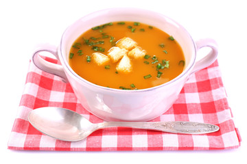 Carrot soup isolated on white