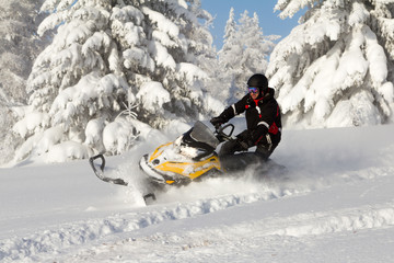 Athlete on a snowmobile