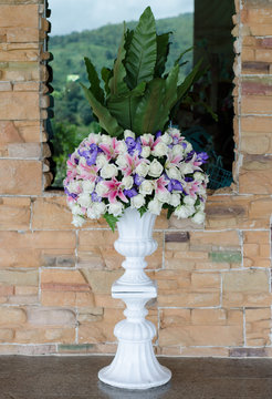 Fototapeta Bunch of flowers in a big decorative vase