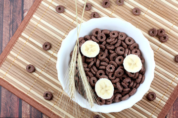 Healthy breakfast - whole grain muesli with a banana.