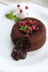 Hot chocolate pudding with fondant centre, close-up