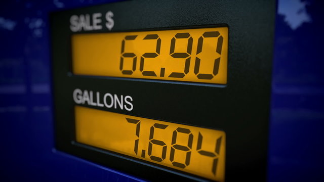 Closeup on gas pump display showing price of an arm and a leg