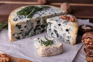 Blue cheese with sprigs of rosemary and nuts