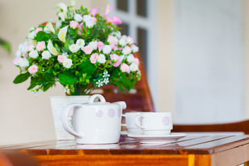 White porcelain set for tea or coffee on wooden table at home ex