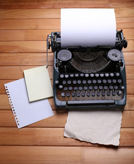 Antique Typewriter. Vintage Typewriter Machine on wooden table