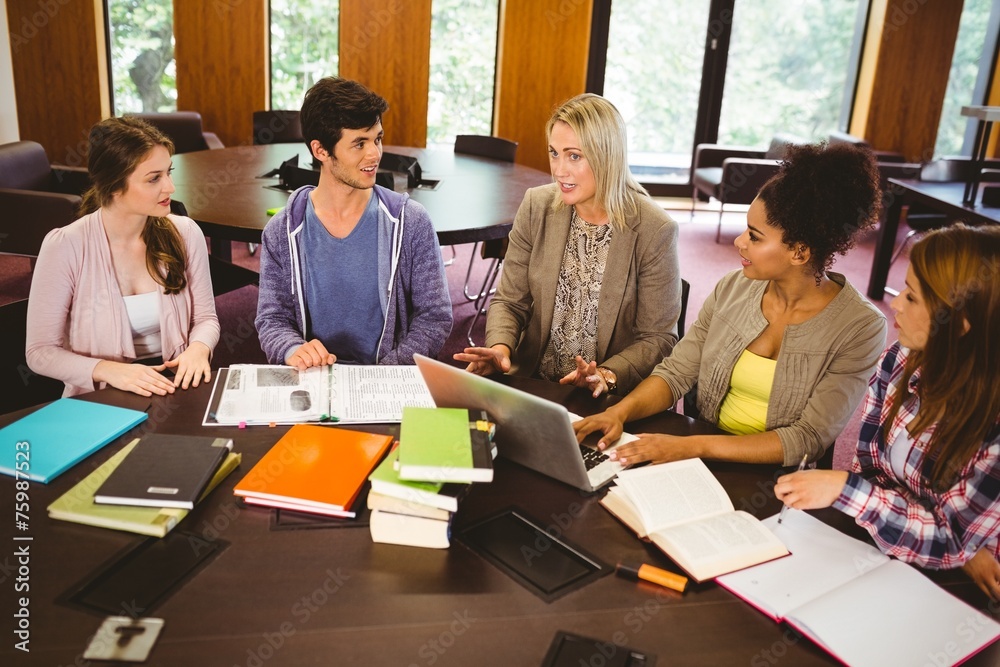 Poster Smiling students working together on an assignment