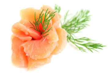 Sliced and rolled salmon isolated on white