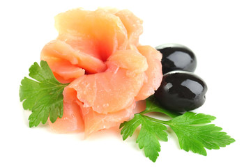 Sliced and rolled salmon, black olive and herbs isolated