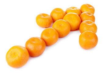 Tangerines in shapw of arrow isolated on white