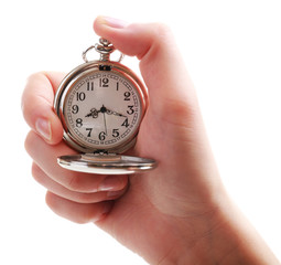 Silver pocket clock in hand isolated on white