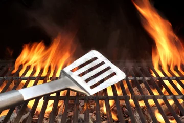 Afwasbaar Fotobehang Grill / Barbecue Spatula on the Barbecue Grill