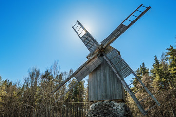 Fototapeta na wymiar Old wooden windmill, close up