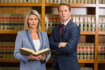 Team of lawyers in the law library