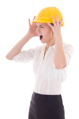 business woman architect in yellow builder helmet shouting isola