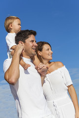 Fototapeta premium Happy Man Woman Child Family Blue Sky