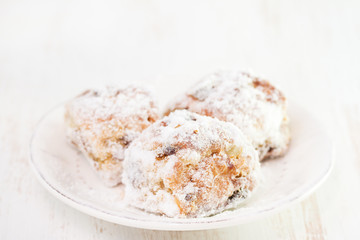 cookies on white dish on white background