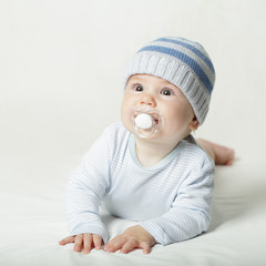 Cute baby in blue clothes