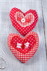 Hearts on white wood background