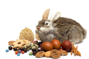 Happy Easter. Easter bunny, colored eggs. Photo.