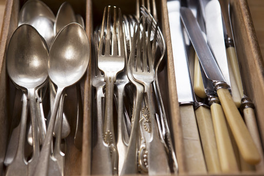 Silver Cutlery Arranged In Drawer