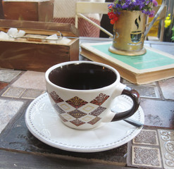 empty coffee cup in  interior of  cafe