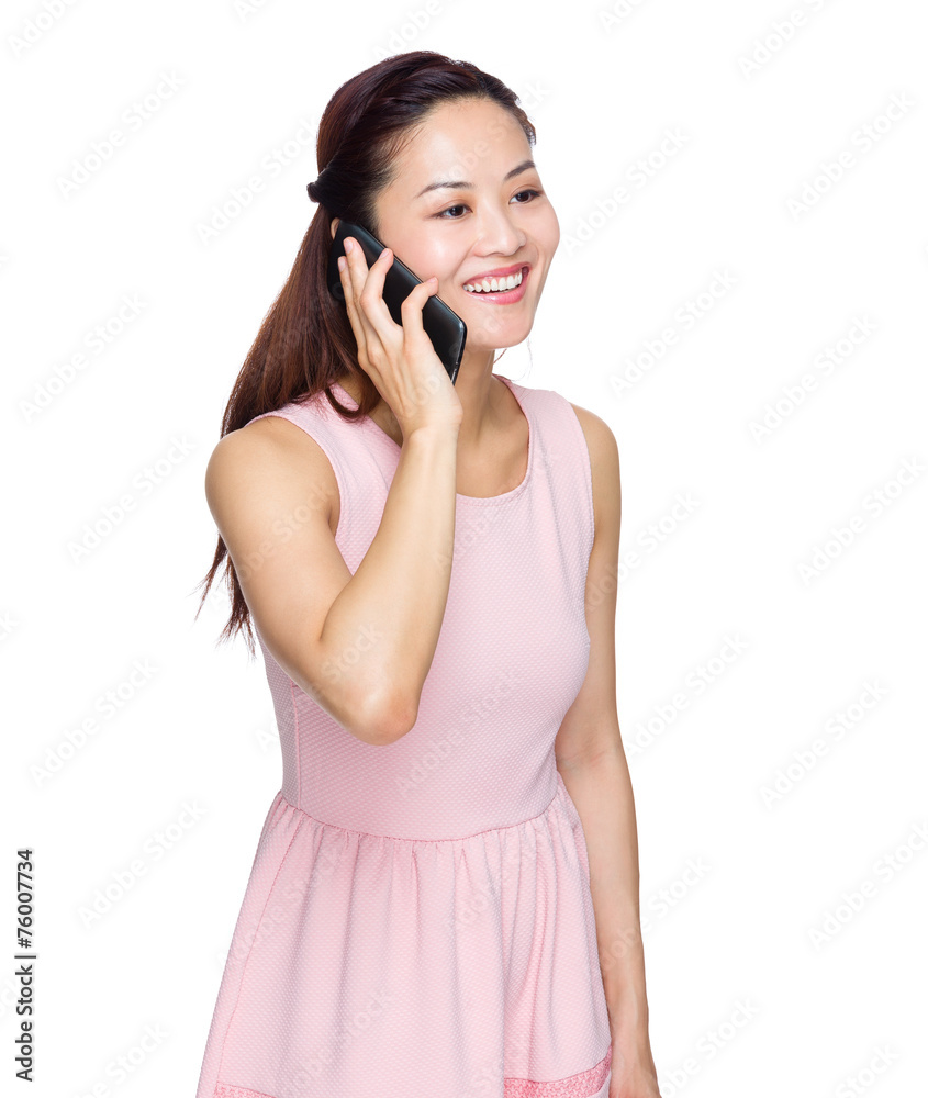 Wall mural Woman talk to mobile phone