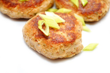 Close Up of Fish Cakes with Sliced scallions