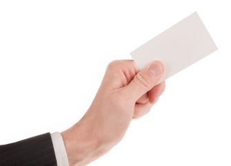Businessman in suit holding a blank business card isolated
