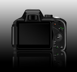 Digital SLR camera (dSLR) with a reflection on a table