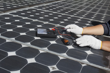 worker repair energy photovoltaic solar panels