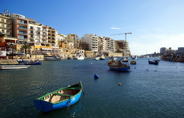Fototapeta na wymiar Beautiful morning at Spinola Bay, St Julian's , Malta.