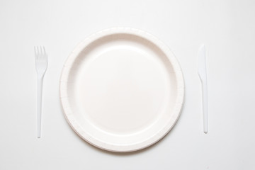 white disposable dishware set in black and white