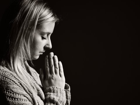 Praying woman.