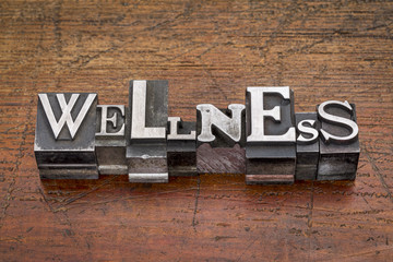 wellness word in metal type