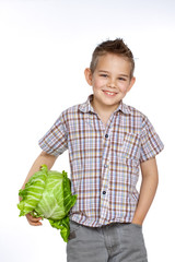 Beautiful little childl with vegetable