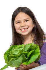 Beautiful little childl with vegetable