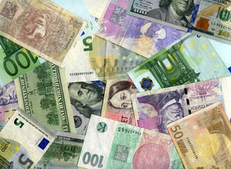 Obraz na płótnie Canvas Background. US dollars, Euro and Czech koruns