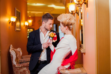 Groom and bride together. Wedding couple in room
