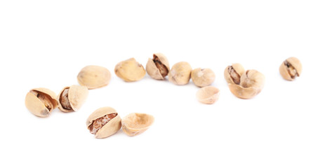 Pile of multiple pistachios isolated