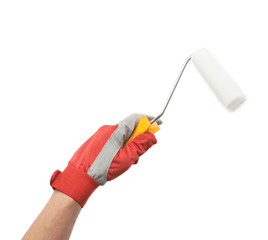 Hand holding a paint roller