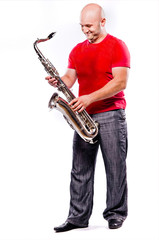 Naklejka premium man playing the saxophone