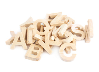 Pile of wooden block letters isolated