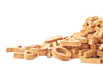 Pile of wooden block letters isolated