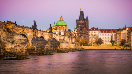 Fototapeta premium Panoramic view on Prague at sunset