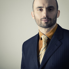 Portrait of handsome stylish man in trendy clothers, toned